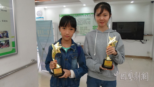 手捧凤凰之星金杯 从化小红豆奋励前行